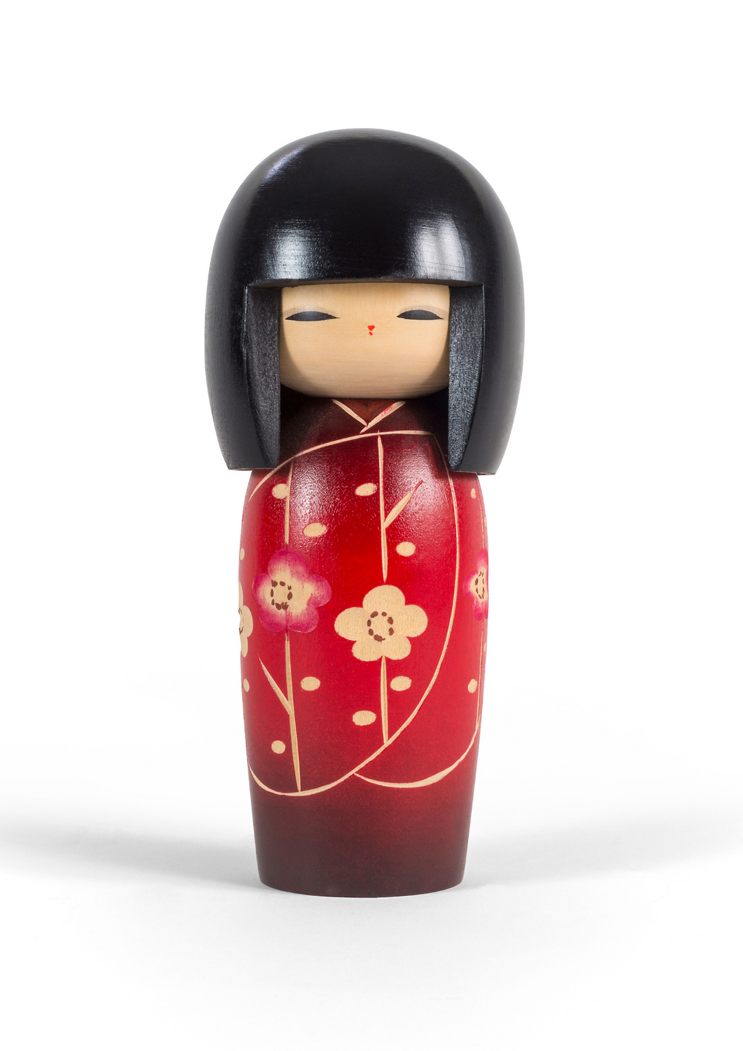 Handcrafted wooden Kokeshi doll representing Japanese culture and artistry.